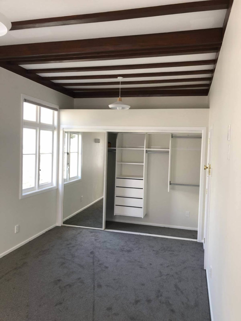 Renovated bedroom showing new wardrobe