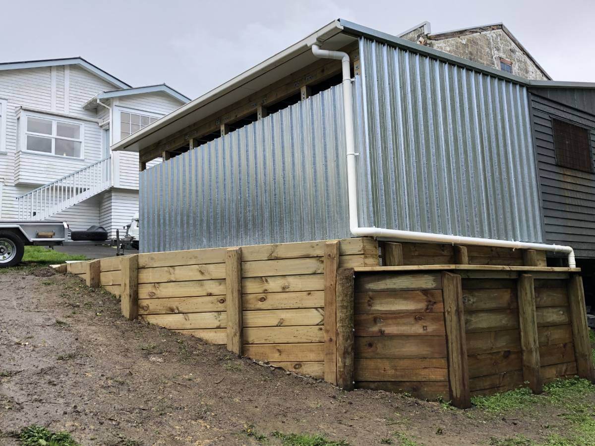 Carport with newly build retaining wall