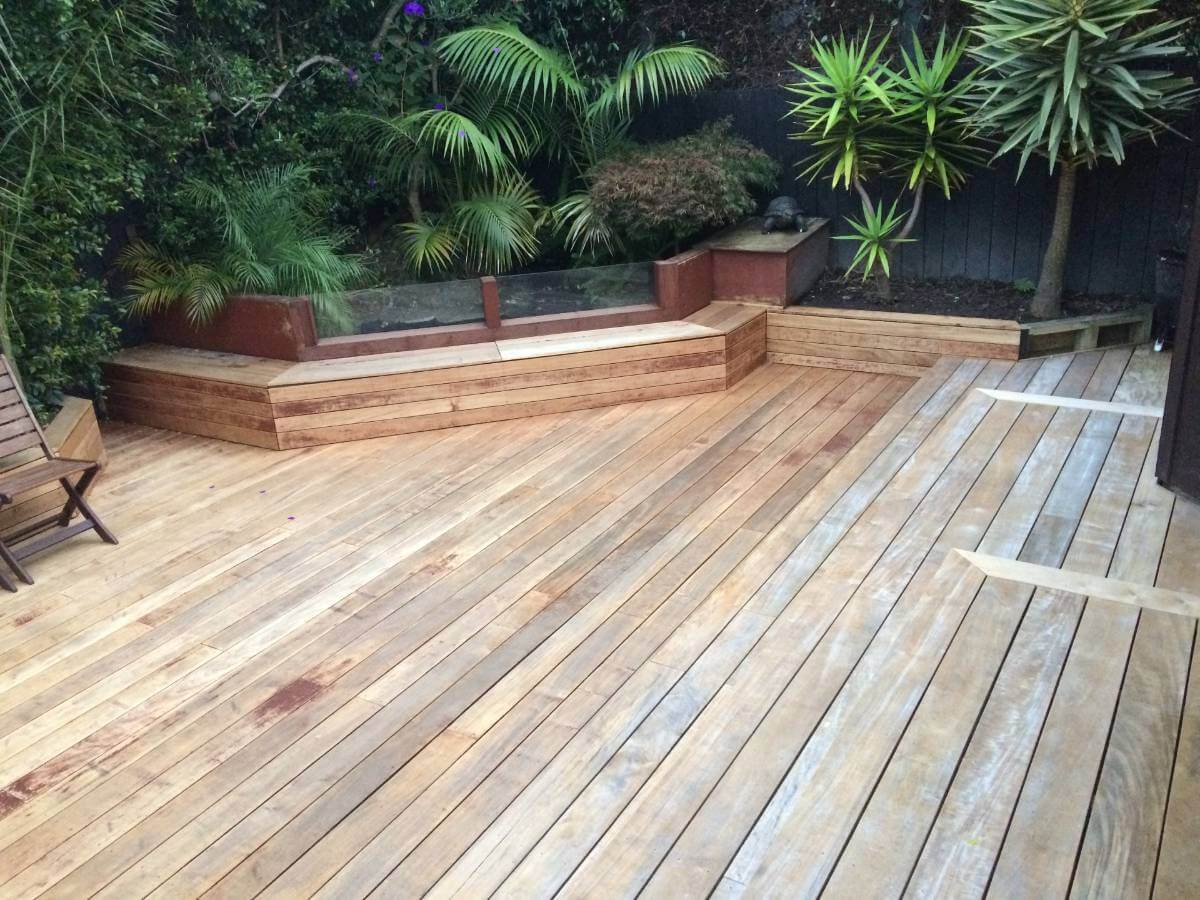 New decking with steps leading down from house